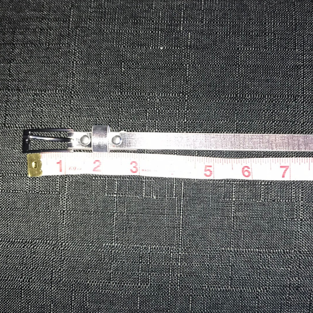 38” (from end to end) silver, faux leather belt